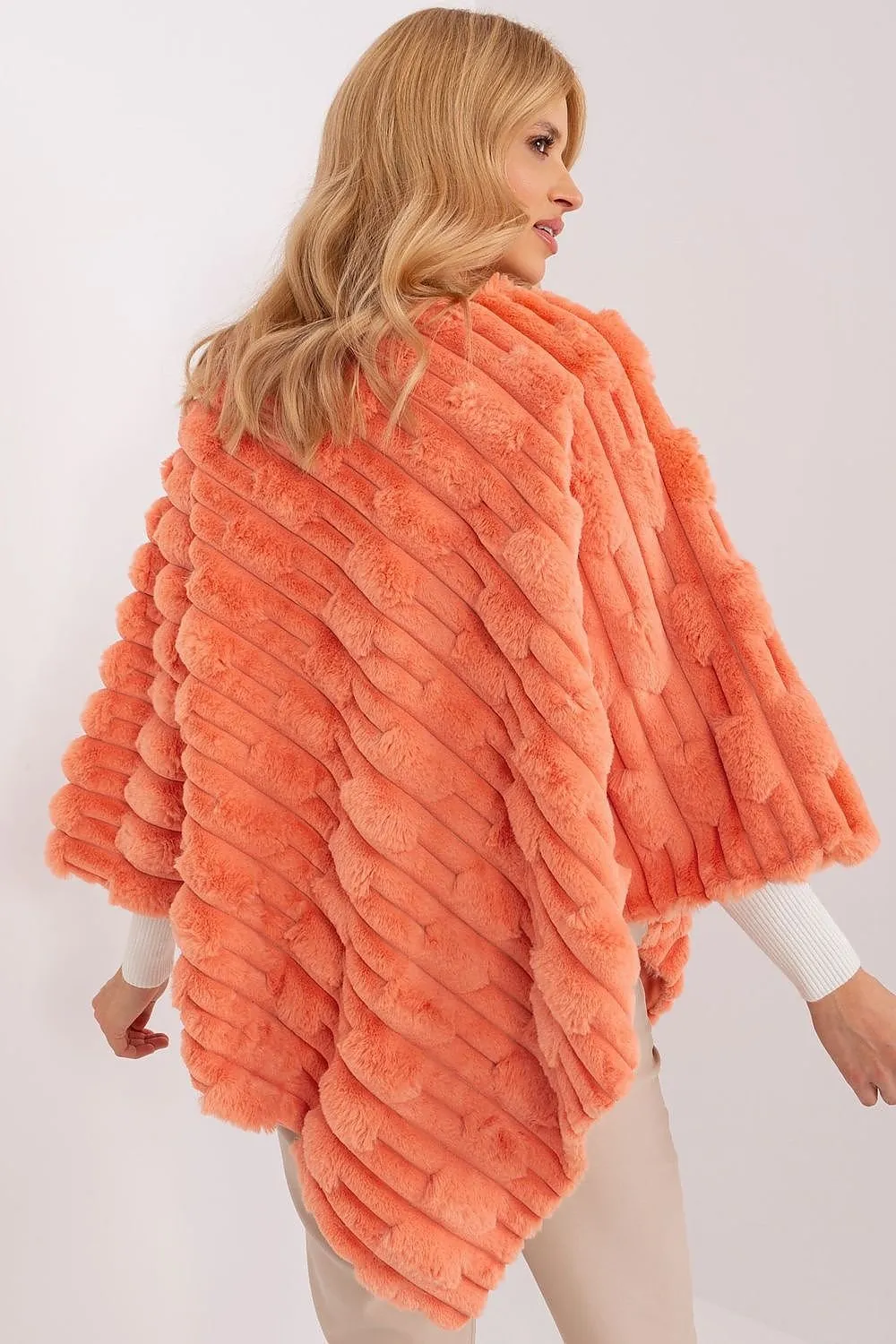 Loose cut varied fabric texture poncho