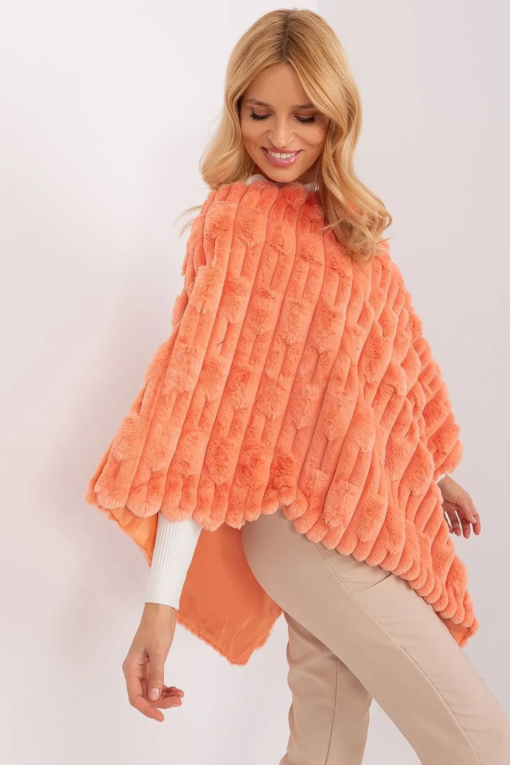 Loose cut varied fabric texture poncho