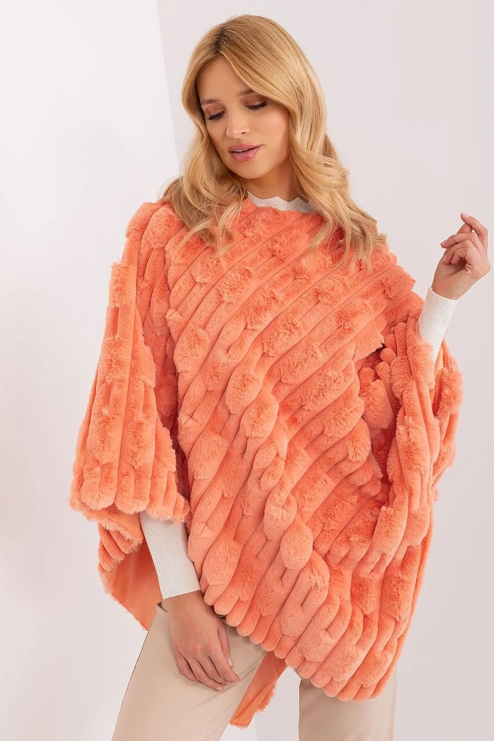 Loose cut varied fabric texture poncho