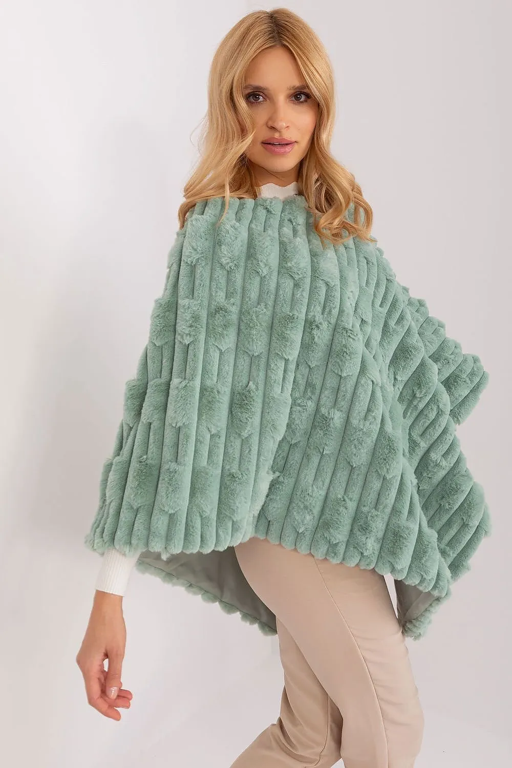 Loose cut varied fabric texture poncho