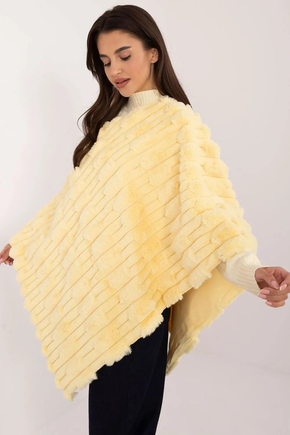 Loose cut varied fabric texture poncho
