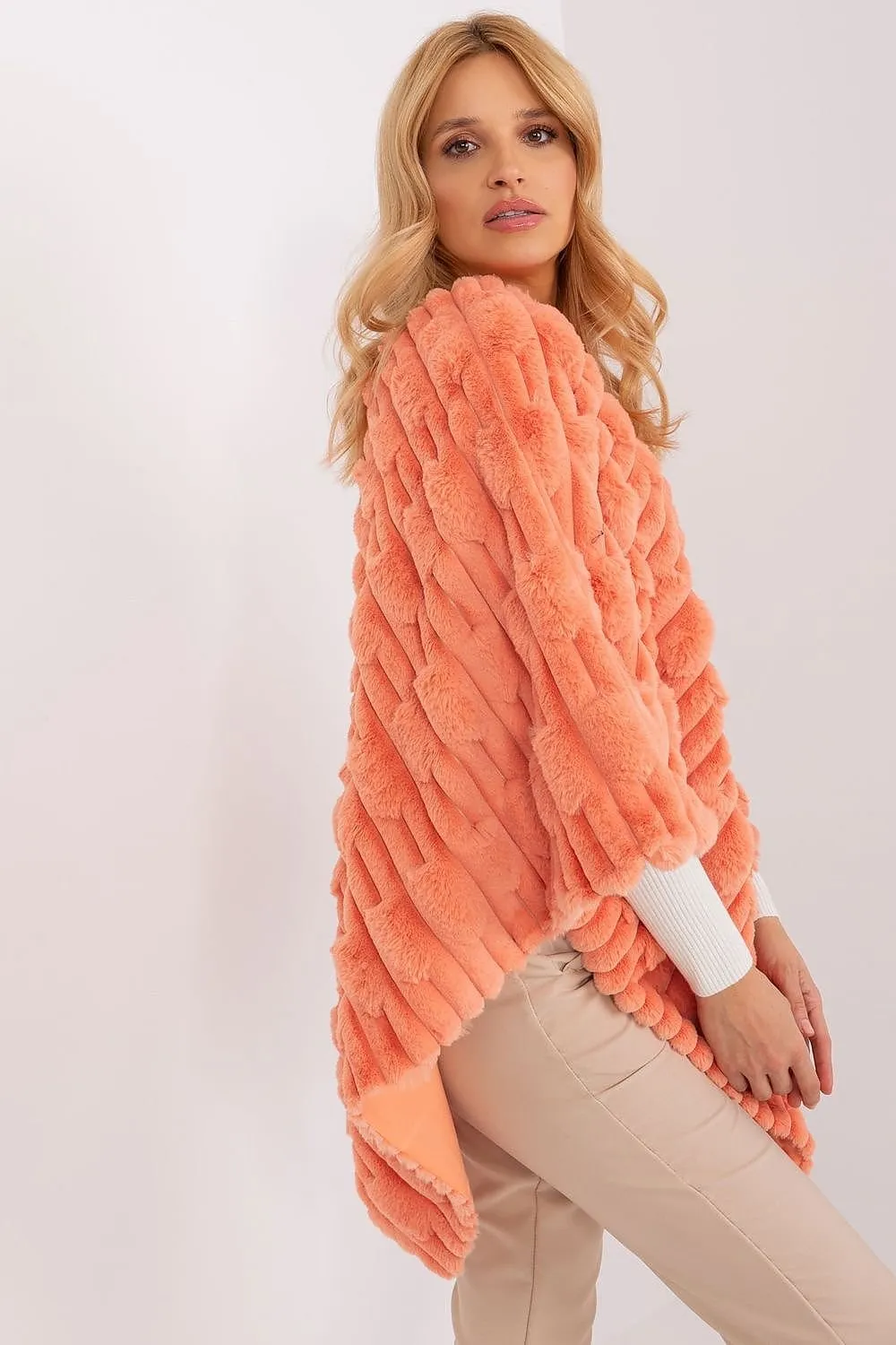 Loose cut varied fabric texture poncho