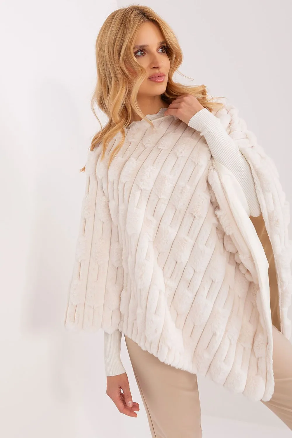 Loose cut varied fabric texture poncho
